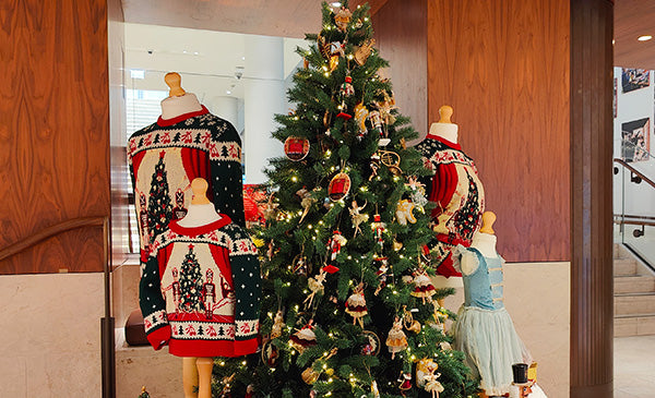 Christmas tree with decorations and Christmas Jumpers in the RBO Shop