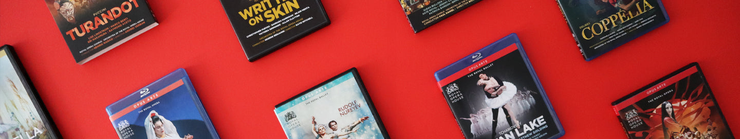 a selection of opera and ballet DVDs and Blu-rays on a red background