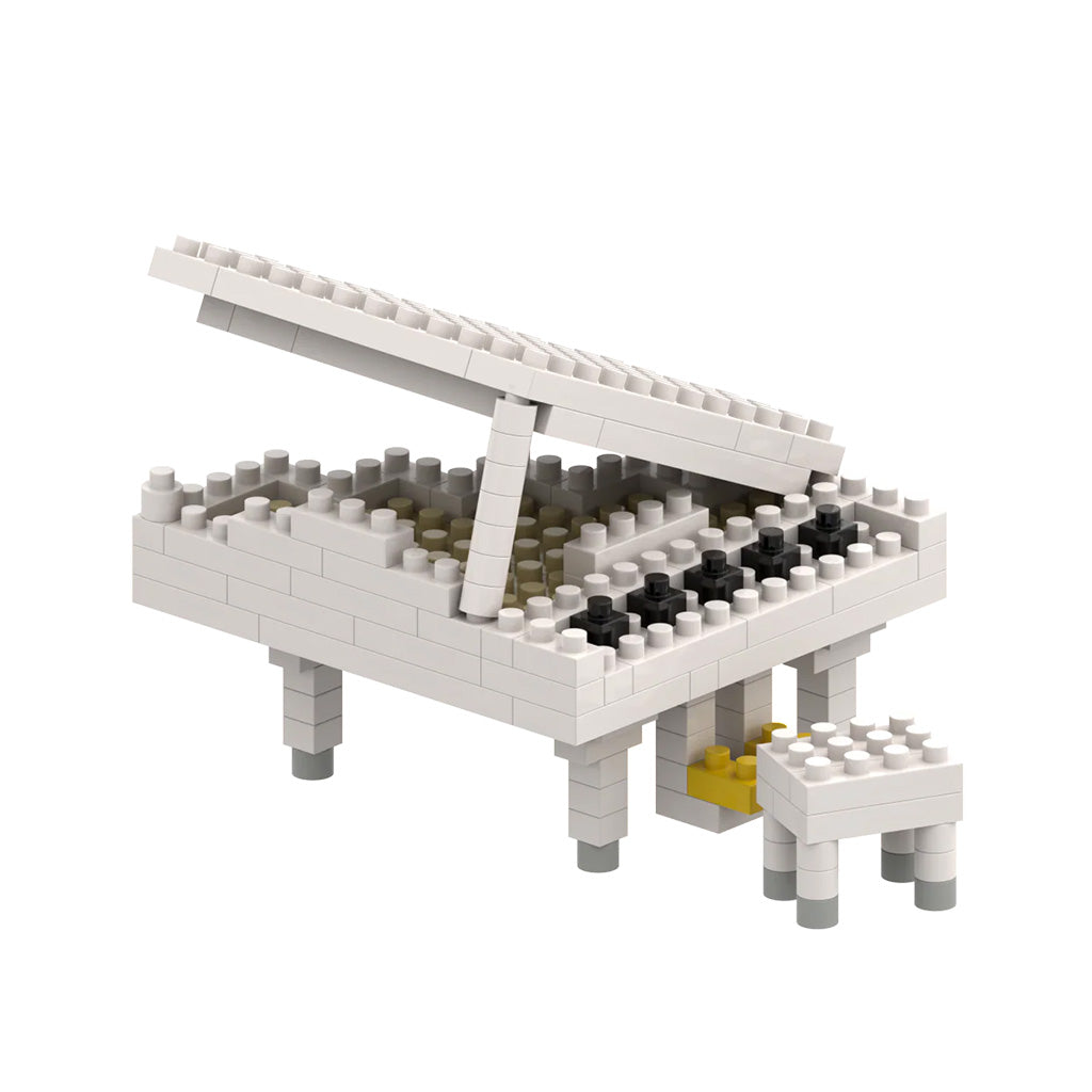 Toy piano made of interlocking bricks on a white background