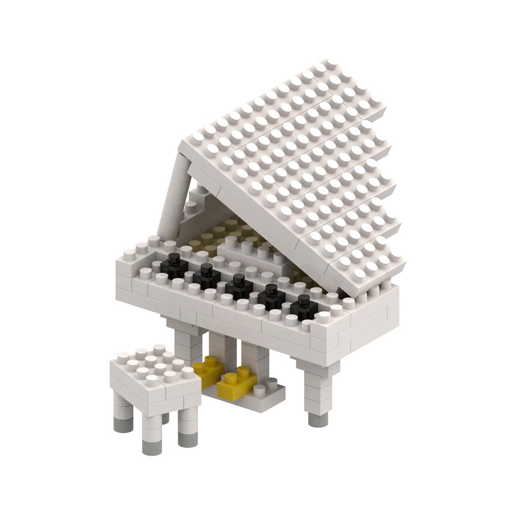 Toy piano made of interlocking bricks on a white background