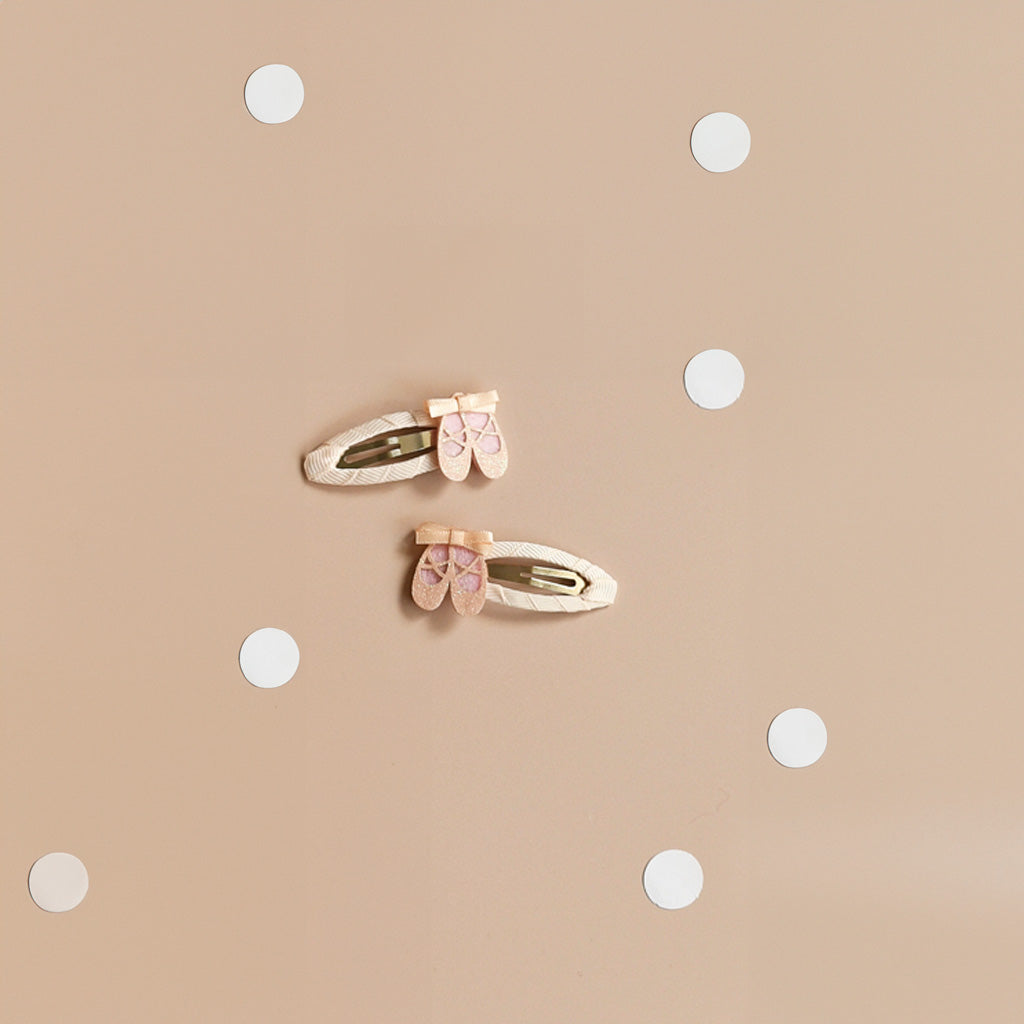 Rockahula Ballet Shoes Hair Clips on pink background with paper polka dots