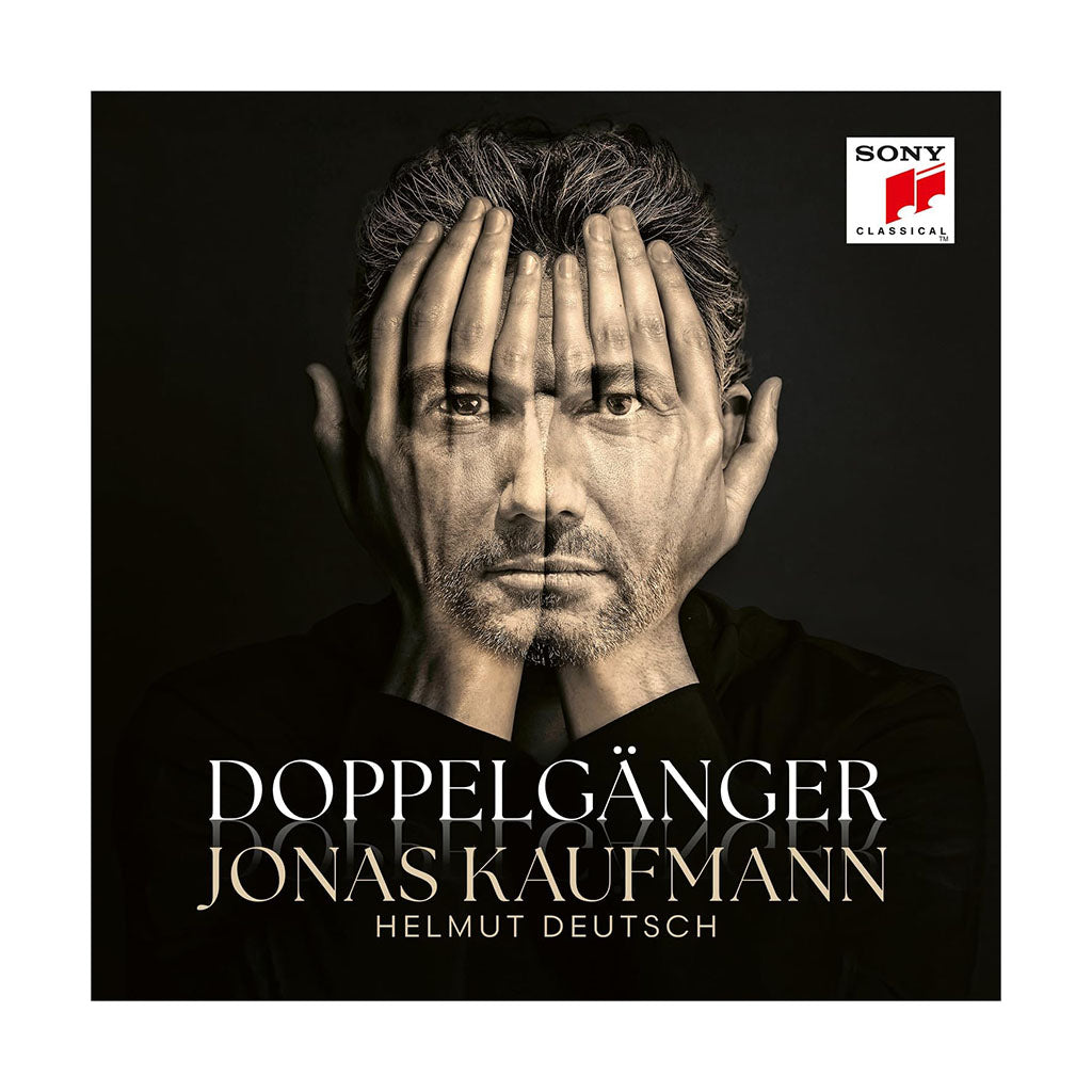 CD Cover for Jonas Kaufmann&#39;s Album Doppleganger with his face seen through his  hands on the cover