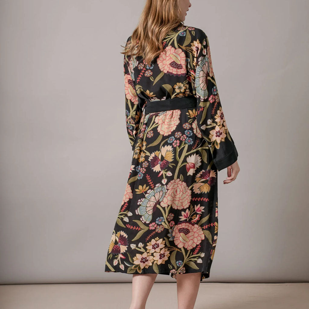 Floral Dahlia patterned robe / gown on a hanger against a white background