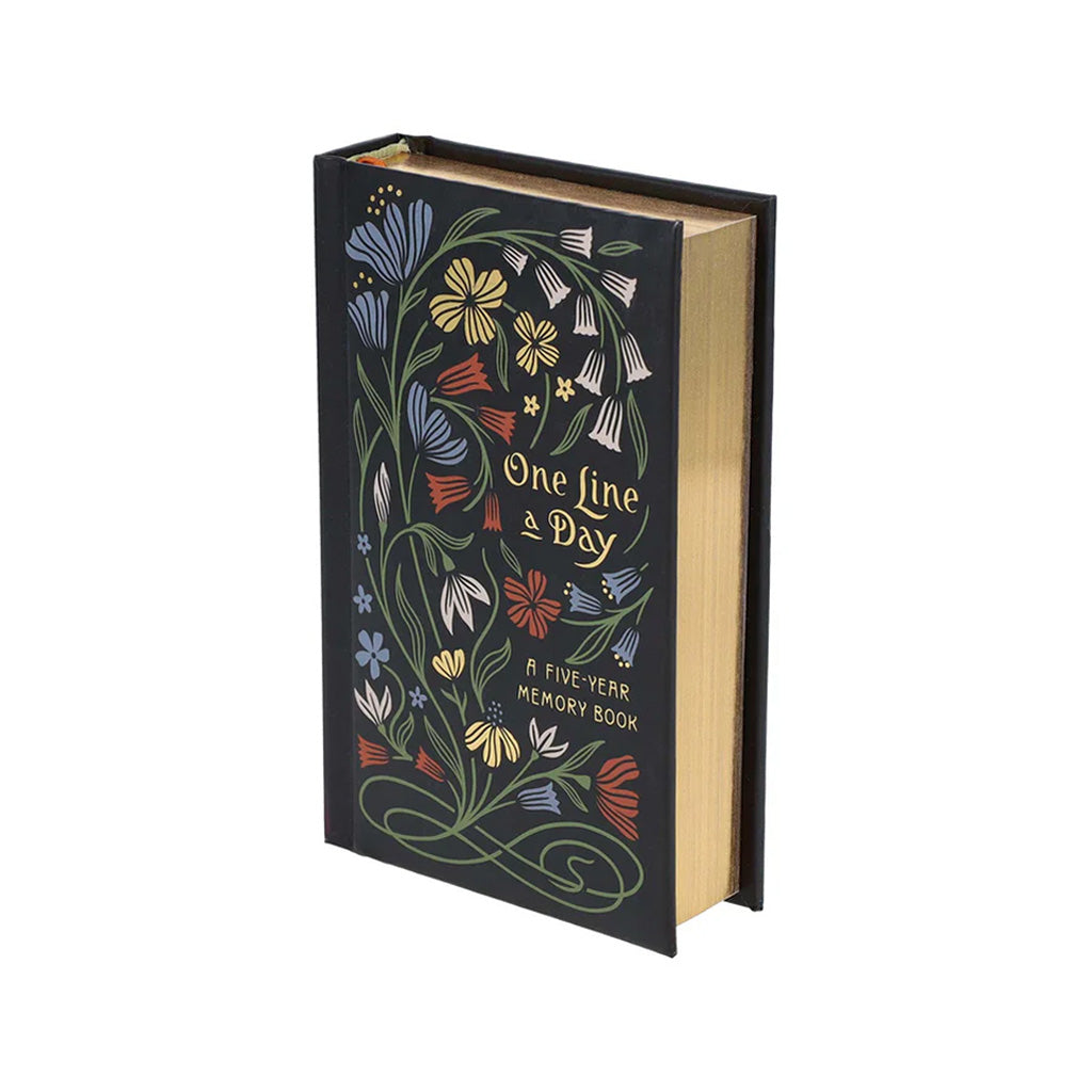 Floral One Line a Day Book from an angled front on view. The cover is black with colourful art nouveau style flowers in blue, red, white, and yellow with green stalks and leaves. In gold text the words 'One Line a Day' and 'A FIVE YEAR MEMORY BOOK' are on the front. The edges of the pages can be seen and are gold. 