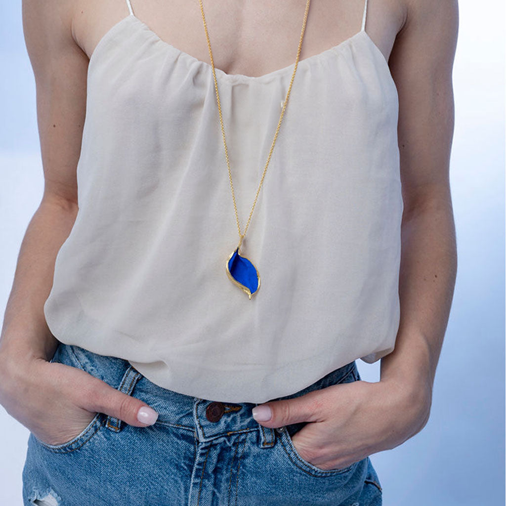 Organic Pod Pendant with long chain on model