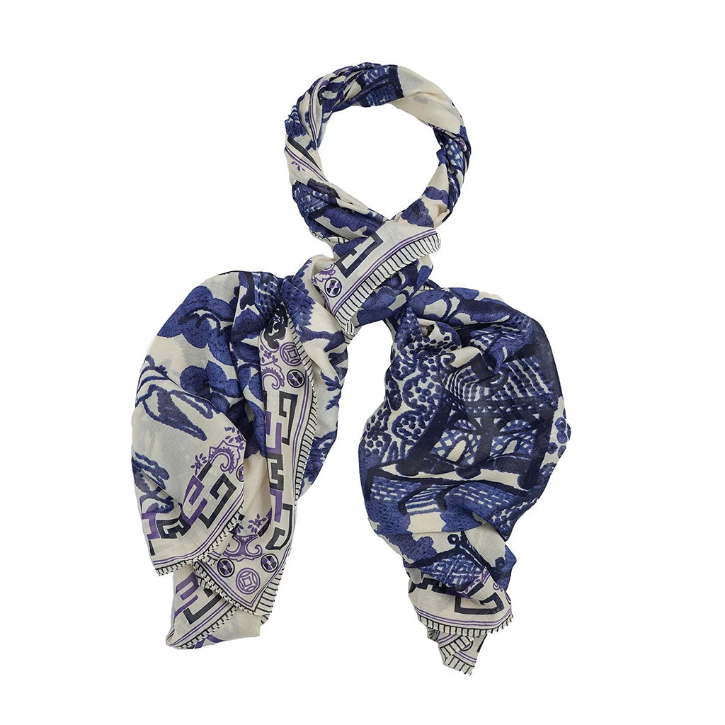 Blue and white patterned scarf on a white background