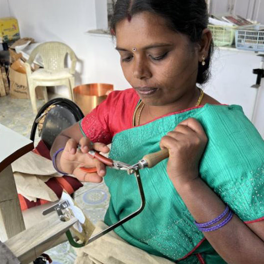 Artisan making the jewellery