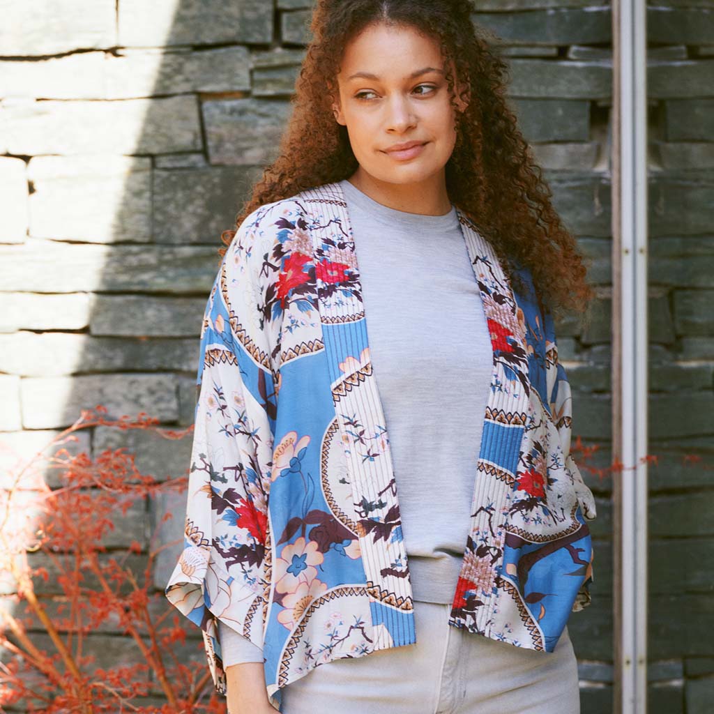 Model in Magnolia Plates Kimono infront of slate wall