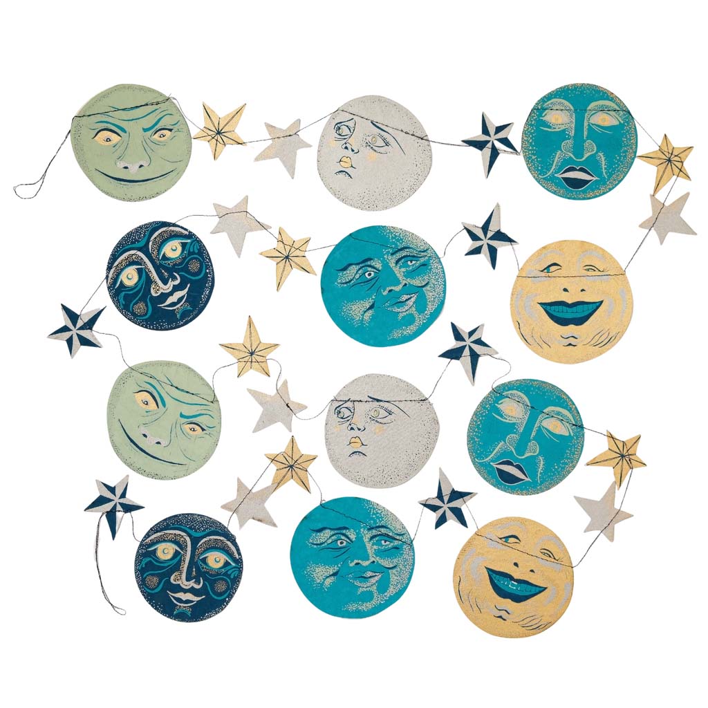paper garland in blues and yellows of moon faces on a white background