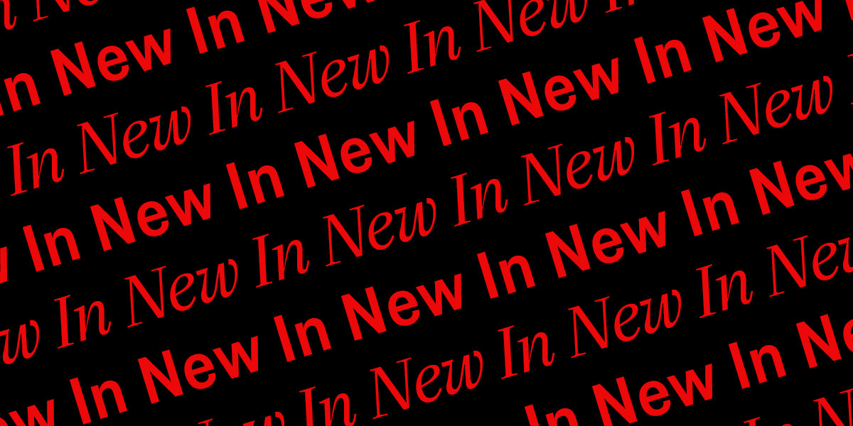 Red serif text reading 'In New' repeated diagonally across a black background.