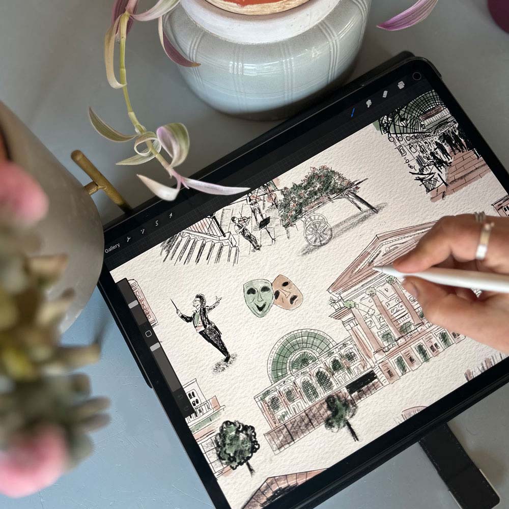 artist Portia Graves drawing the design on an ipad