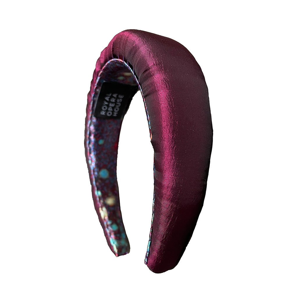 purple costume fabric padded headband on a white background