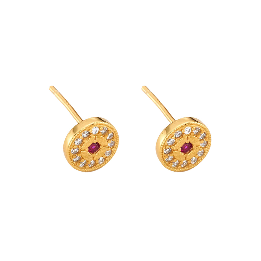 gold stud earrings with a red stone centre surrounded by diamonds on a white background