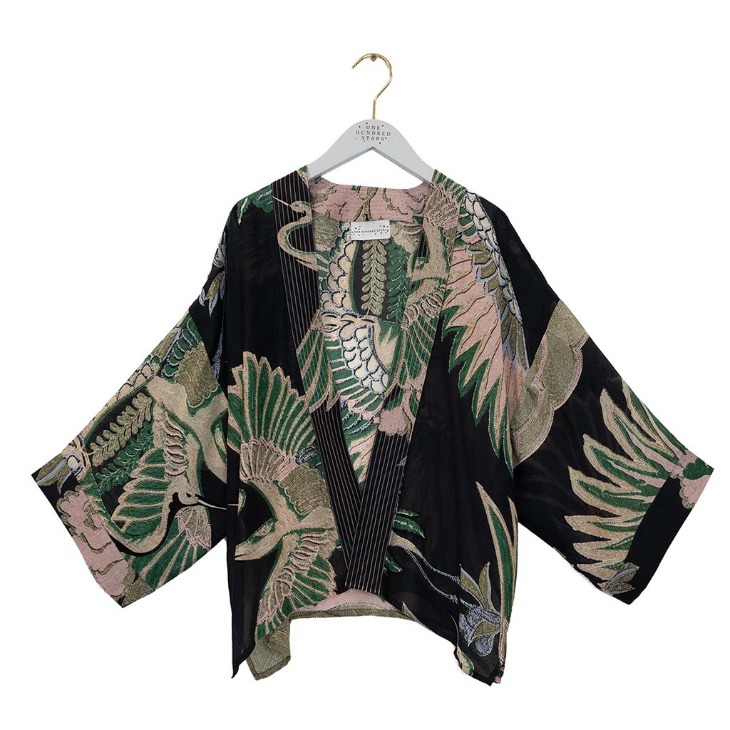 Black and green kimono style jacket on a white background