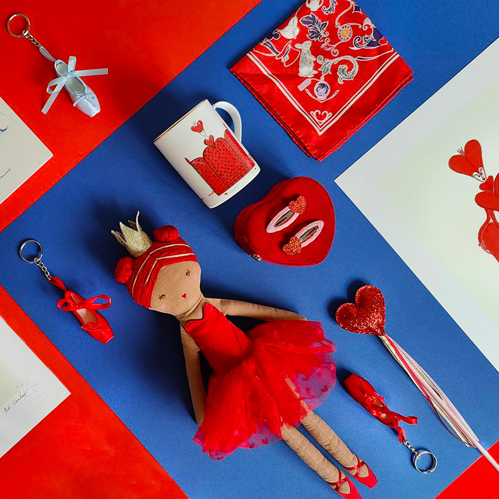 Flat lay of Alice products on a red and blue background