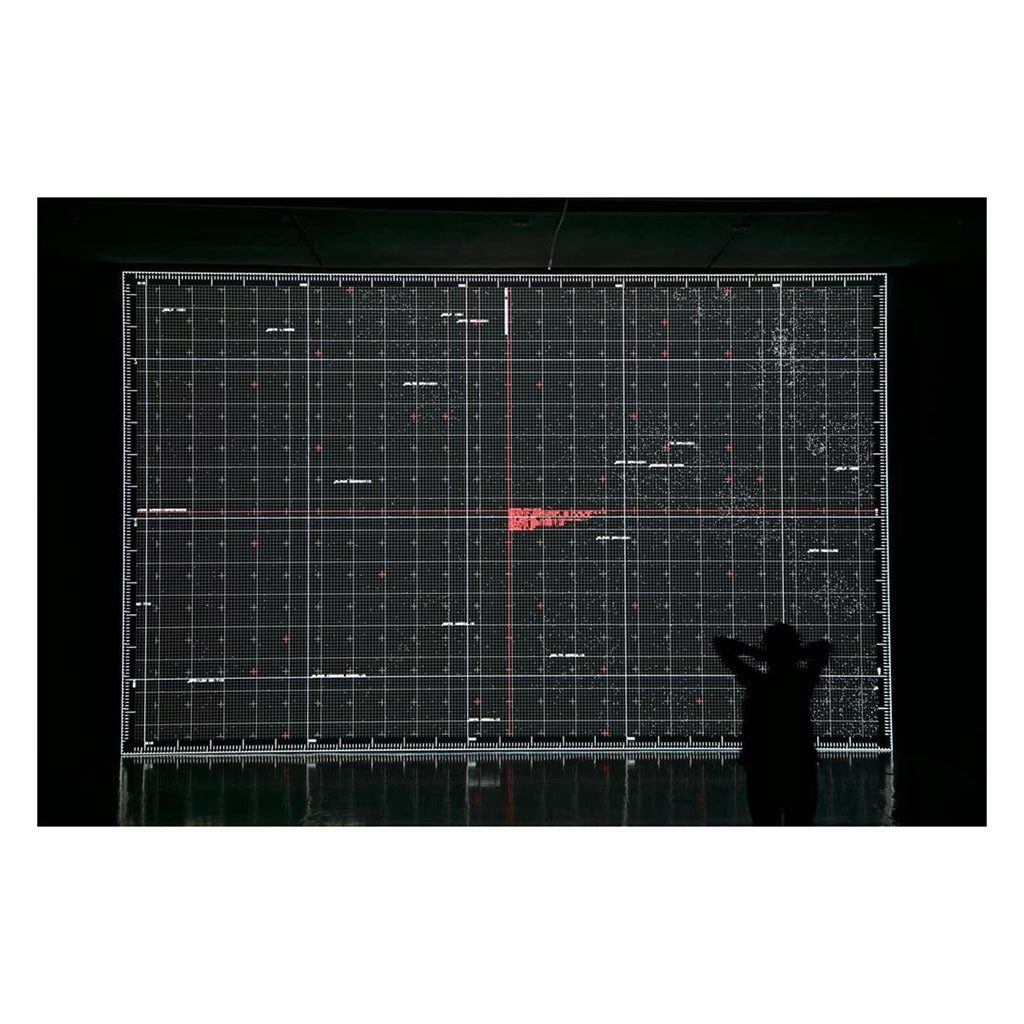 Large grid layout with a person's silhouette in front, on a black background