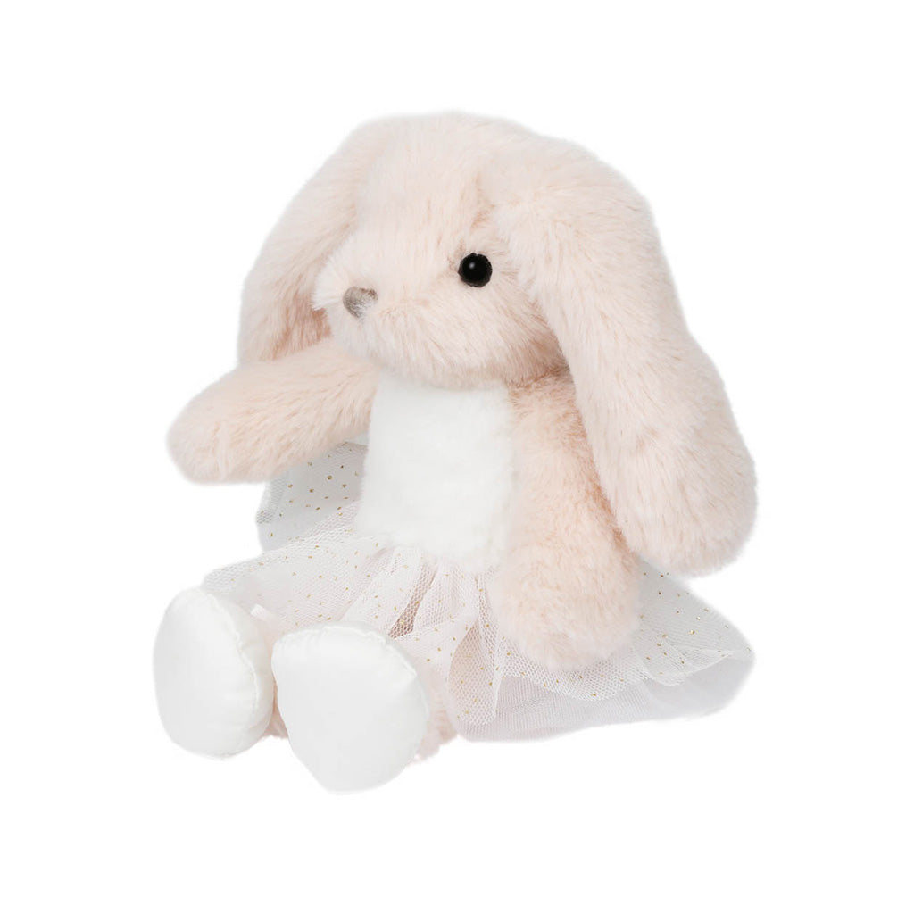 A plush bunny doll with long floppy ears, soft blush fur, a white front, and a white tutu dress with tiny gold speckles, seated against a plain white background.