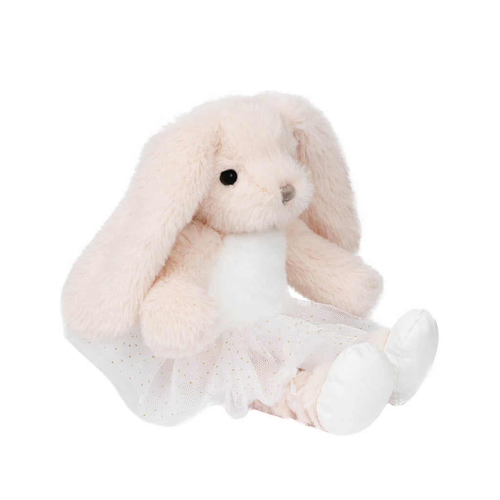 A plush bunny doll with long floppy ears, a white front and a white tutu skirt with tiny polka dots, photographed on a clean white background.