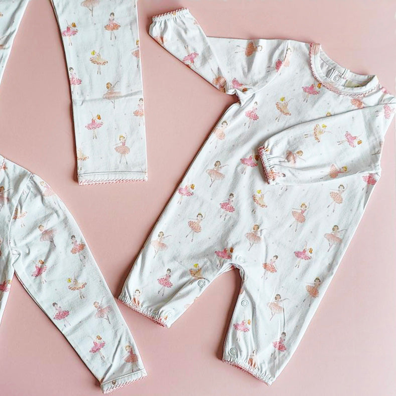Ballet Dancer Baby Grow flat lay on pink background