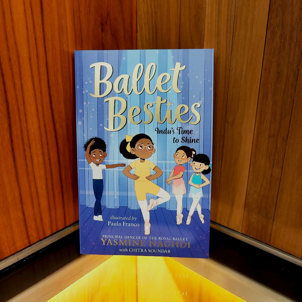Ballet Besties: Indu&#39;s Time to Shine Book in the linbury foyer with wood background