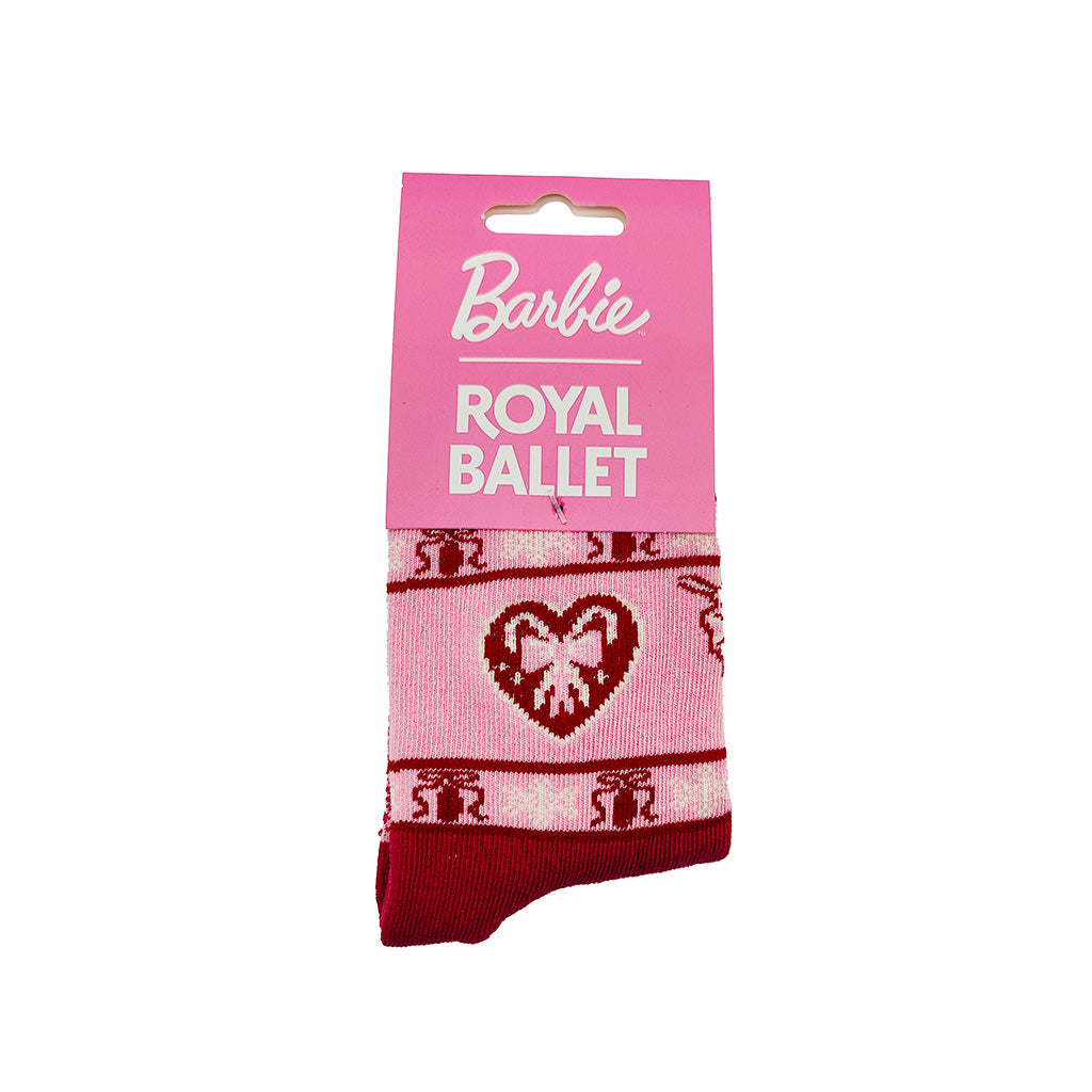 A pair of Barbie Royal Ballet socks in pink and red, shown on their original pink cardboard hanger packaging against a white background.