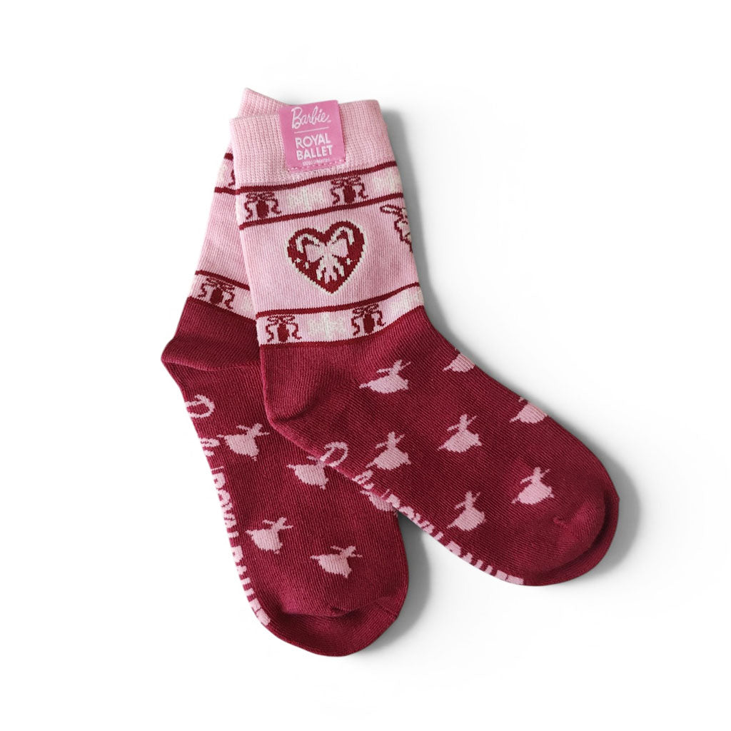A pair of children Barbie Royal Ballet socks featuring a pink and burgundy colour scheme with a ballet dancer pattern and a heart motif, displayed on a clean white background.