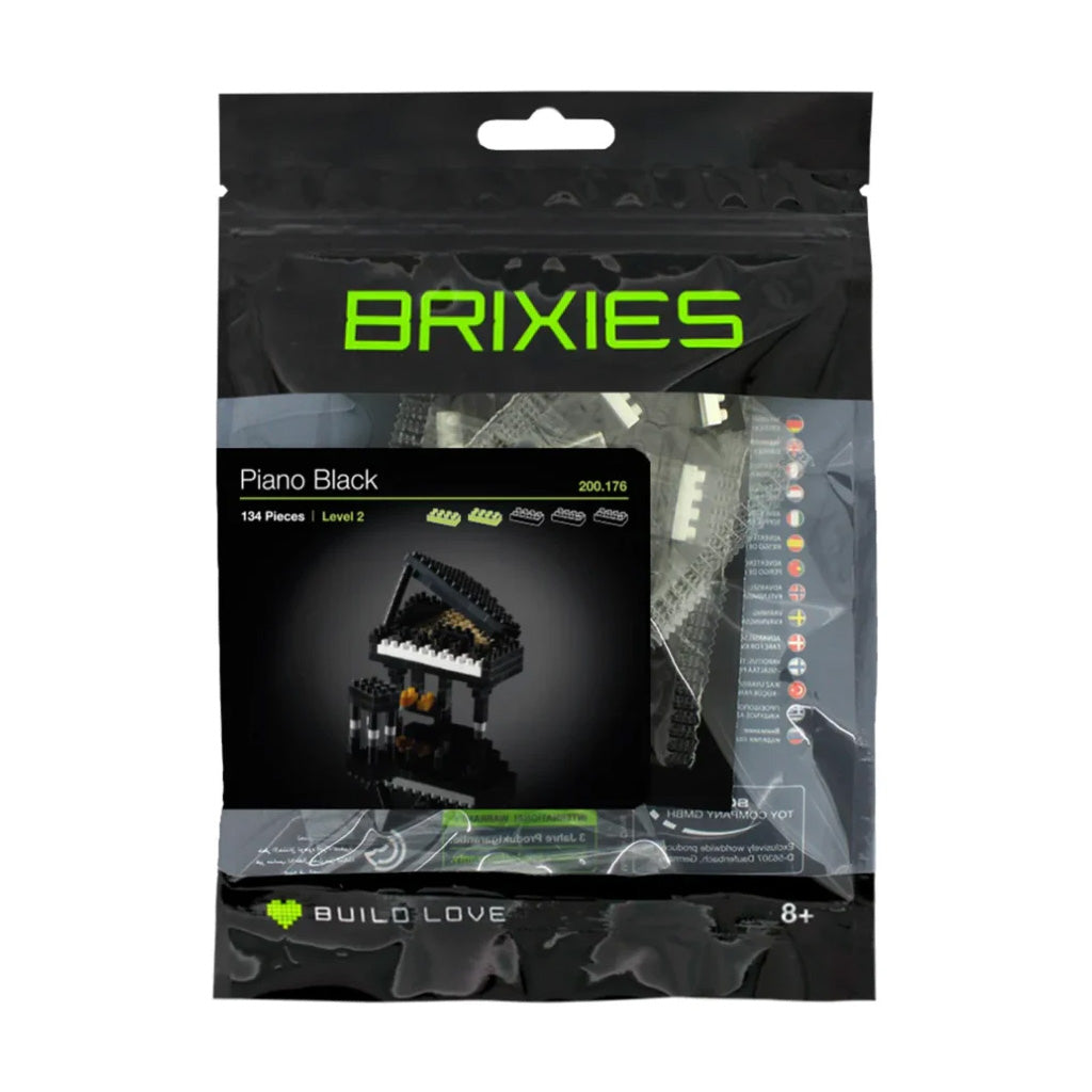brixies kit for a black grand piano in black and green packaging on a white background
