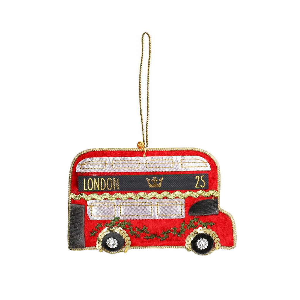 Red London bus decoration with gold accents on a white background