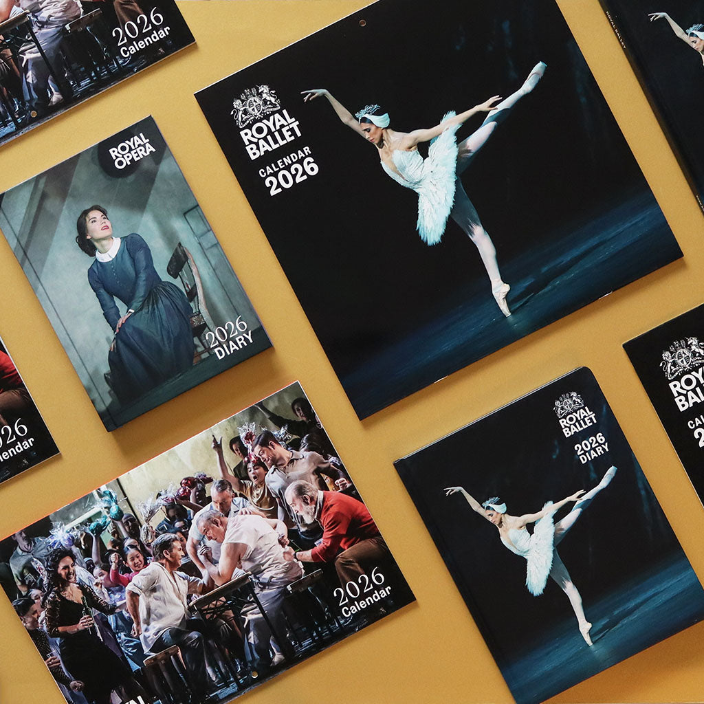 Collection of Royal Ballet 2026 calendars and diaries on a gold surface