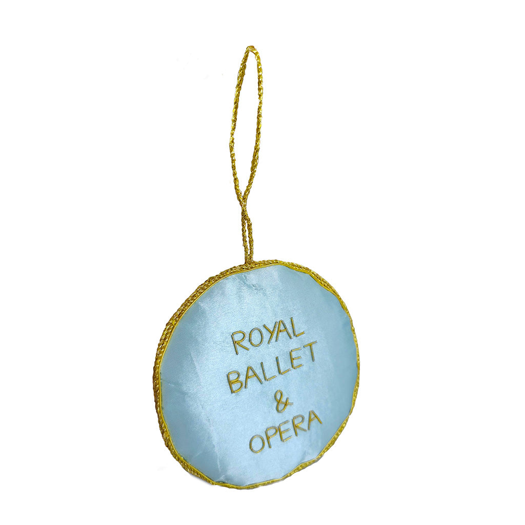 Back view of the ceiling Decoration - round blue with gold trim and text &#39;Royal Ballet &amp; Opera&#39; on a white background