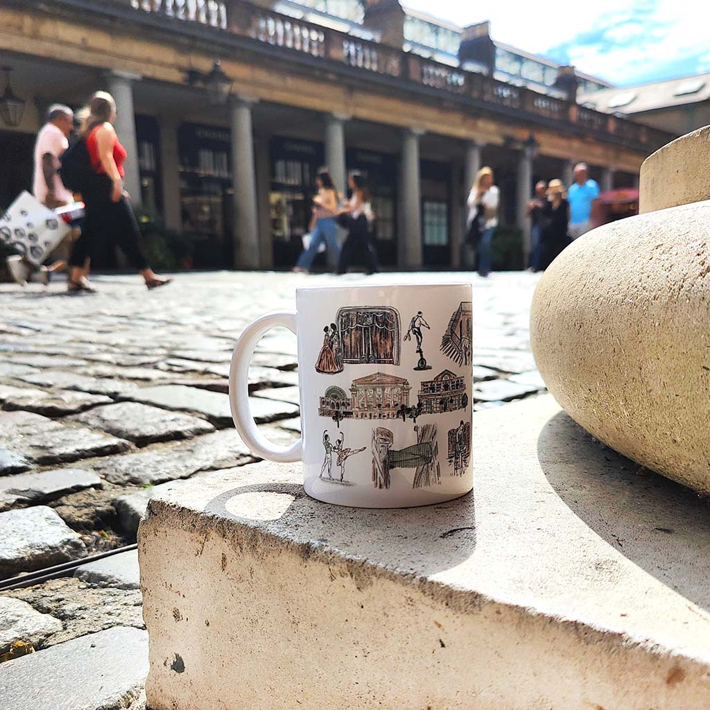 Covent Garden mug with illustrations on a stone collumn in an Covent Garden Piazza