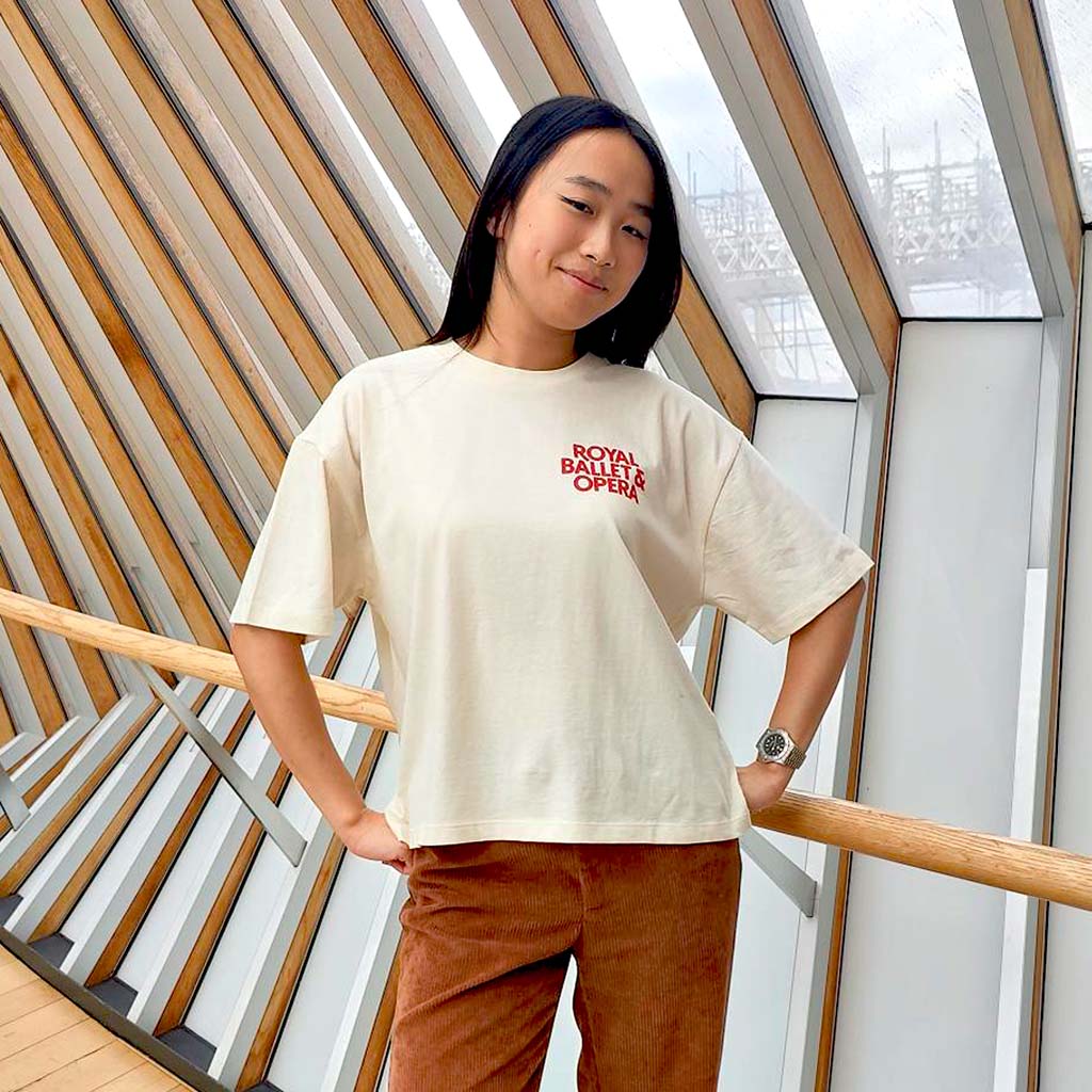 model in RBO Cream Oversized T-Shirt on the bridge of aspiration