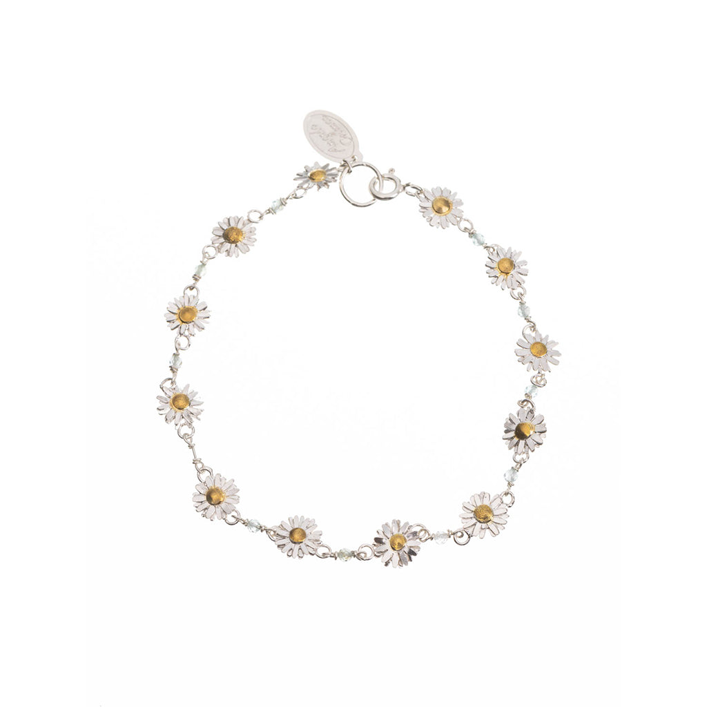 daisy bracelet, silver with 9ct gold flower centres and aquamarine beads on a white background
