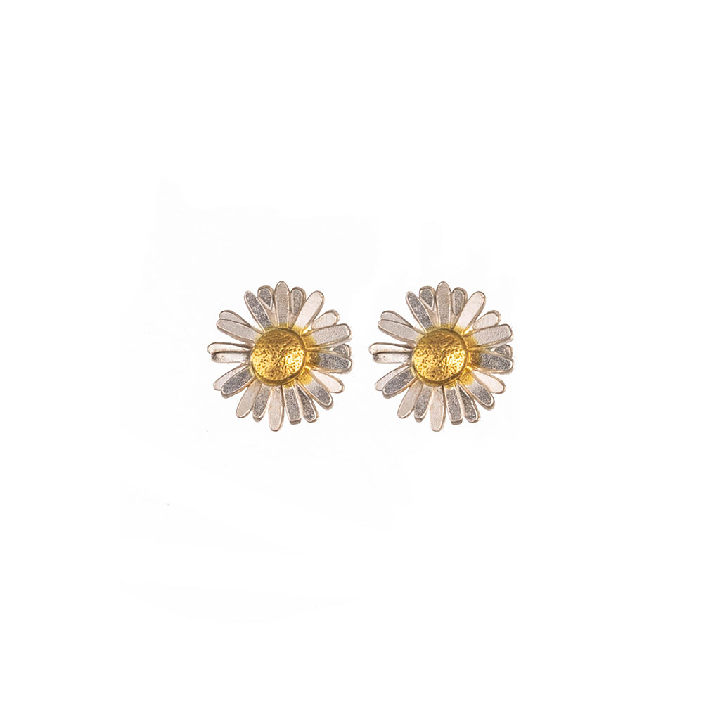 silver and gold daisy stud earrings on a white background