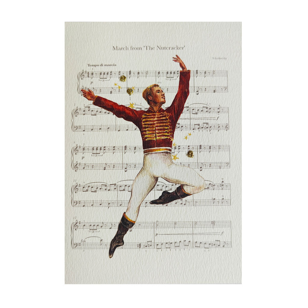 A greeting card featuring a Nutcracker dancer in a red and gold striped jacket and white pants leaping over musical notation, with the text 'March from The Nutcracker' at the top.