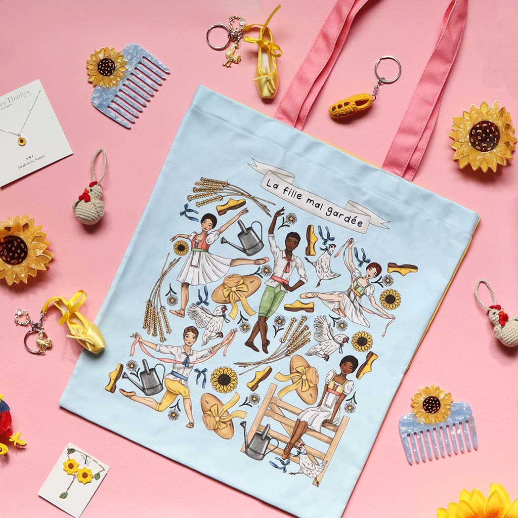 La Fille mal gardee ballet tote back on a pink background with other ballet themed items