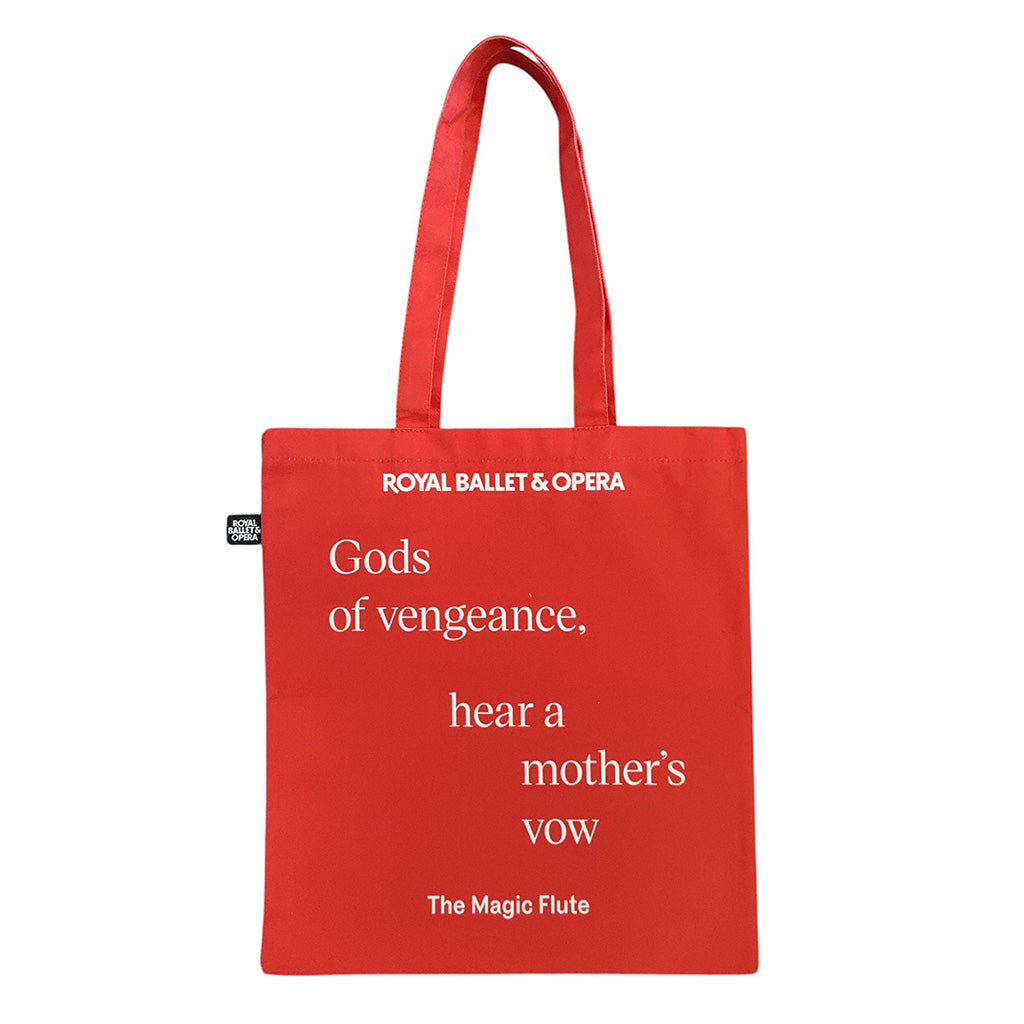 Red tote bag with white text featuring a quote from &#39;The Magic Flute&#39; by Royal Ballet &amp; Opera on a white background.