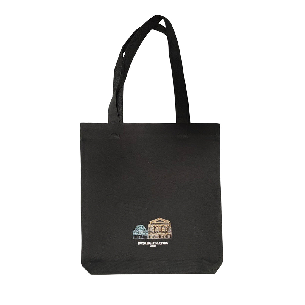 Black tote bag with the Royal Opera House embroidered on the front with white text Royal Ballet &amp; Opera London on a white background
