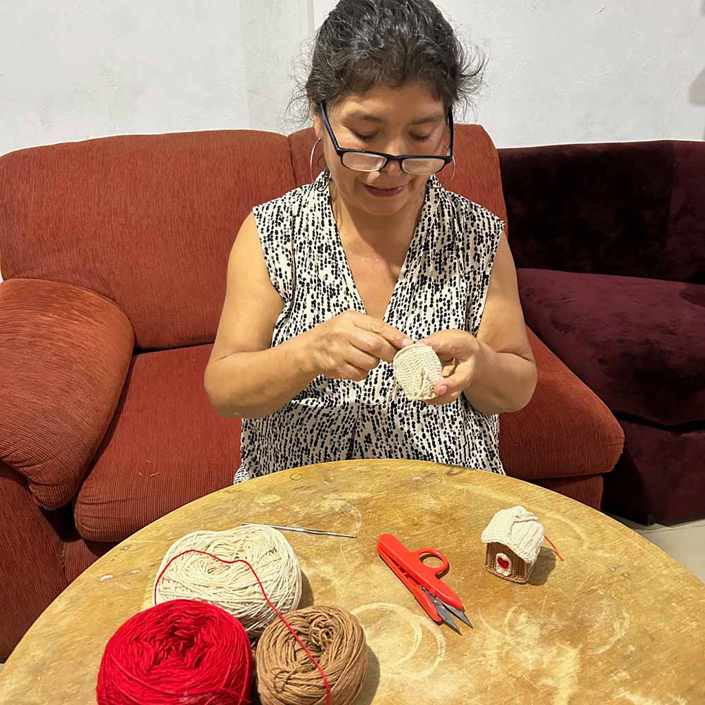 Crochet Gingerbread House Decoration being made by the Hope Project 