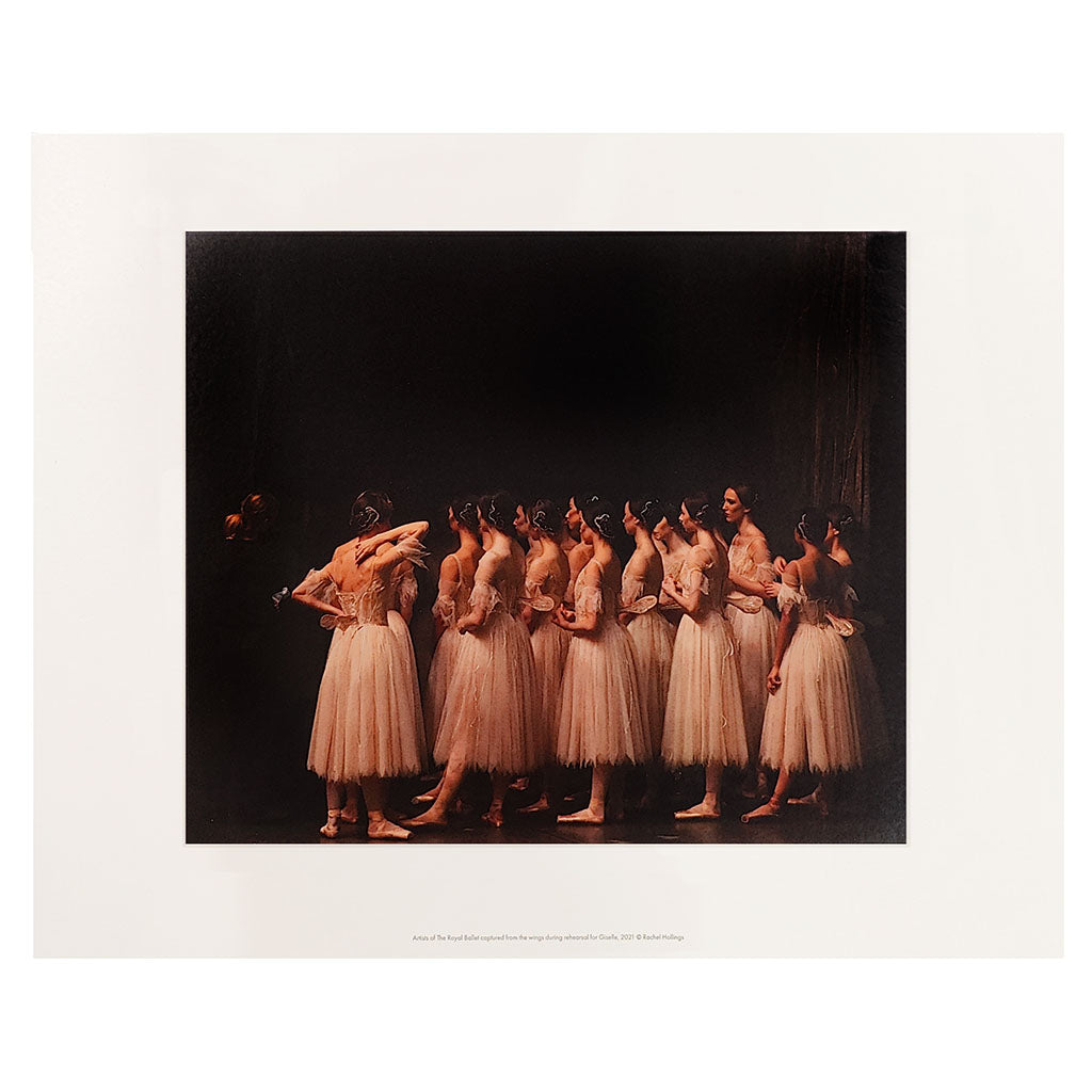 Mini print of a photograph from Giselle of a line of dancers on a dark background
