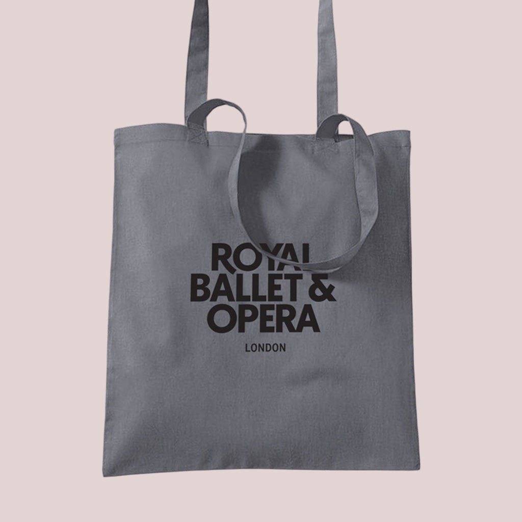 grey tote bag with 'Royal Ballet & Opera London' in back texts on a white background