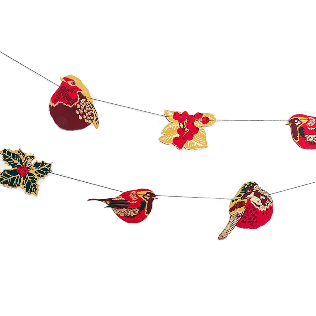 Hedgerow paper garland with robins, holly and berries on a string on a white background