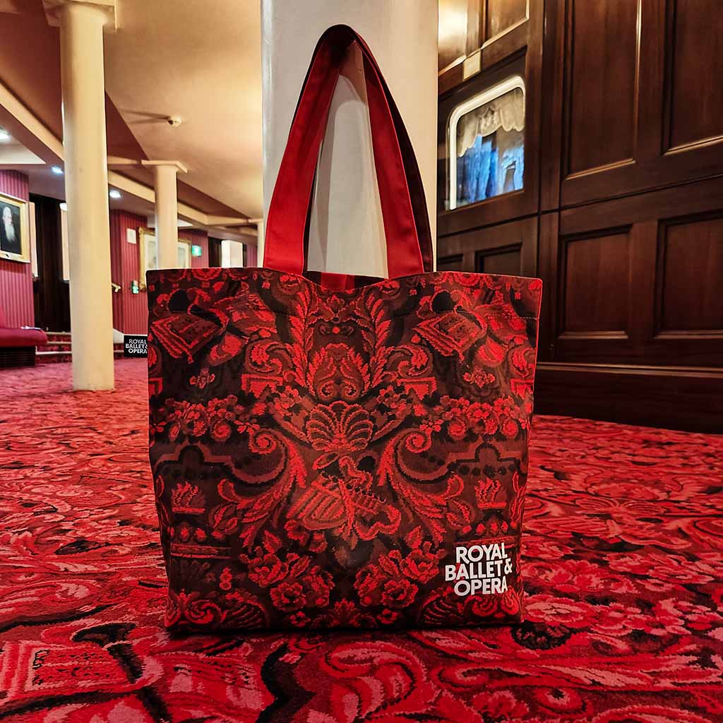 Carpet design view of the heritage tote by a column on the matching carpet