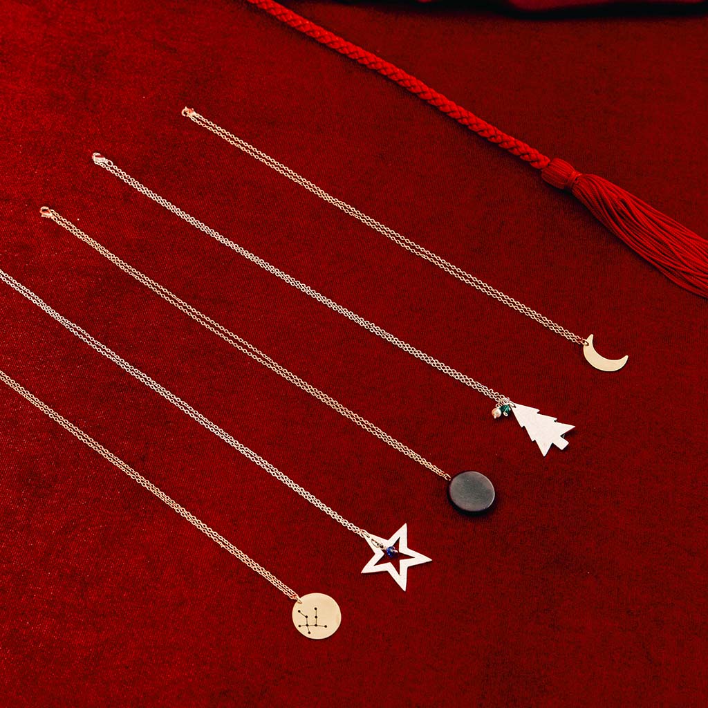 Just Trade necklaces including magic flute