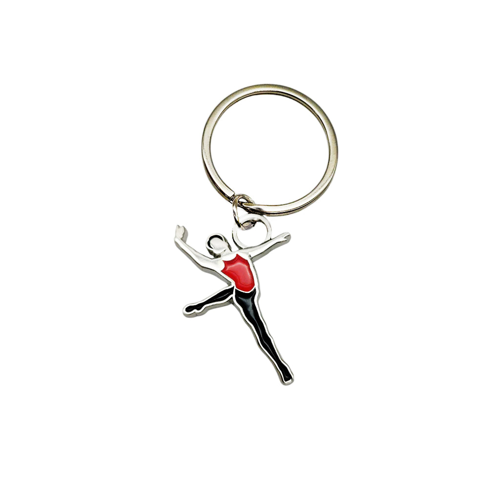 Keyring with a dancing figure design on a white background