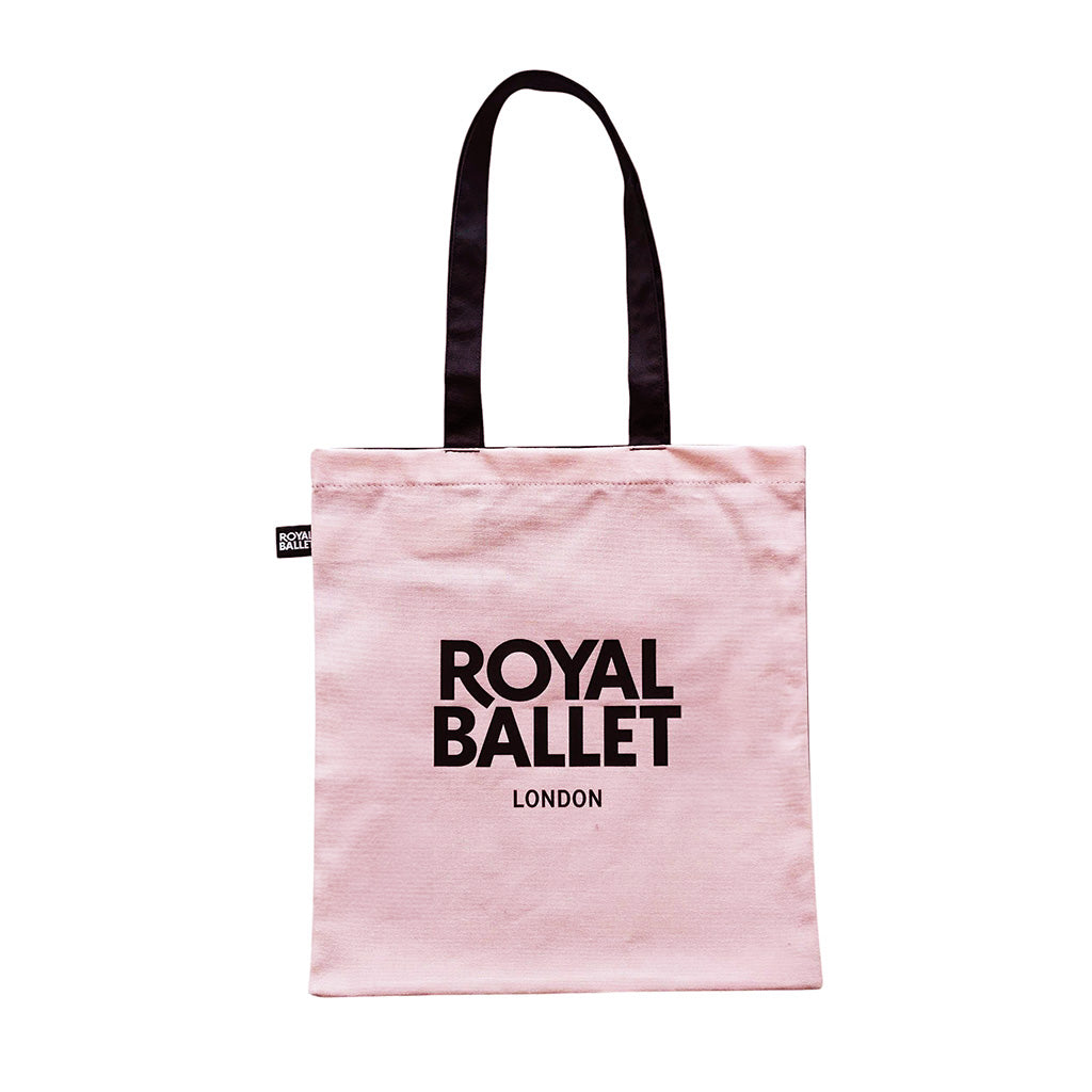 Back of the Life without The Royal Ballet Tote pink with black 'Royal Ballet London' text on a white background