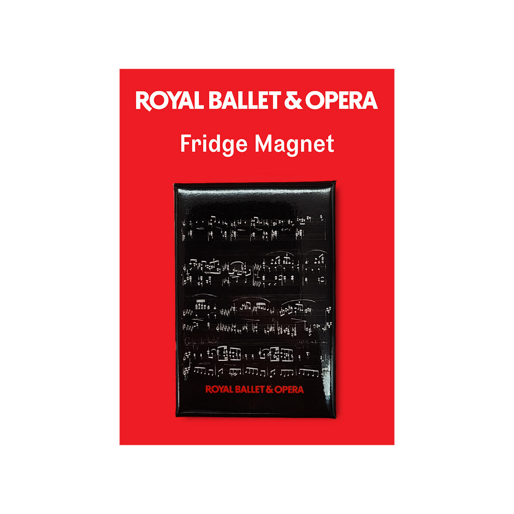 A rectangular black fridge magnet featuring white musical notation and the text 'ROYAL BALLET &amp; OPERA' at the bottom, centered on a bright red background with white text reading 'ROYAL BALLET &amp; OPERA' and 'Fridge Magnet'.