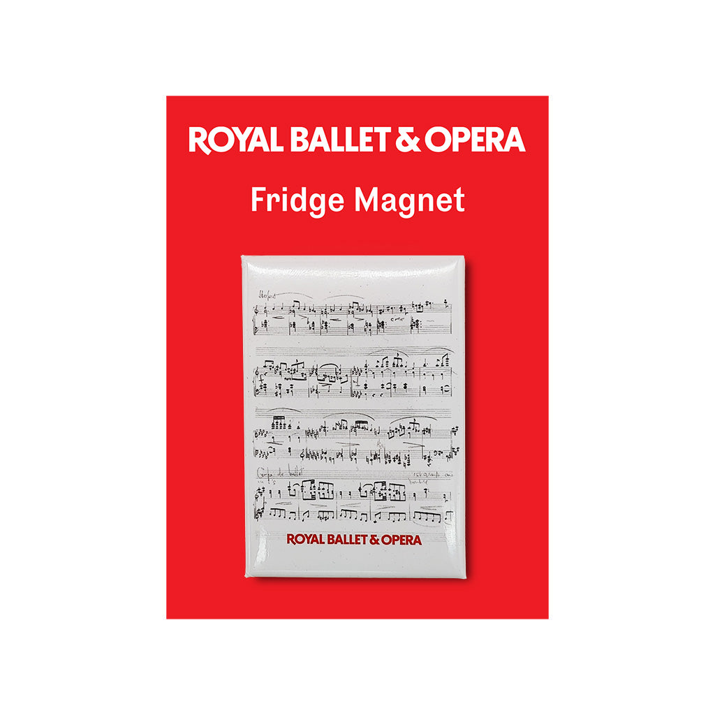 A product card for a Royal Ballet &amp; Opera Fridge Magnet, featuring a white sheet of music with black musical notation on a bright red background.