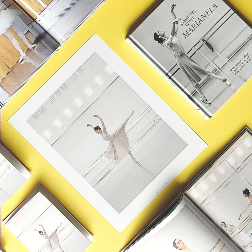 Marianela Nuñez Print surrounded by her book and greeting cards