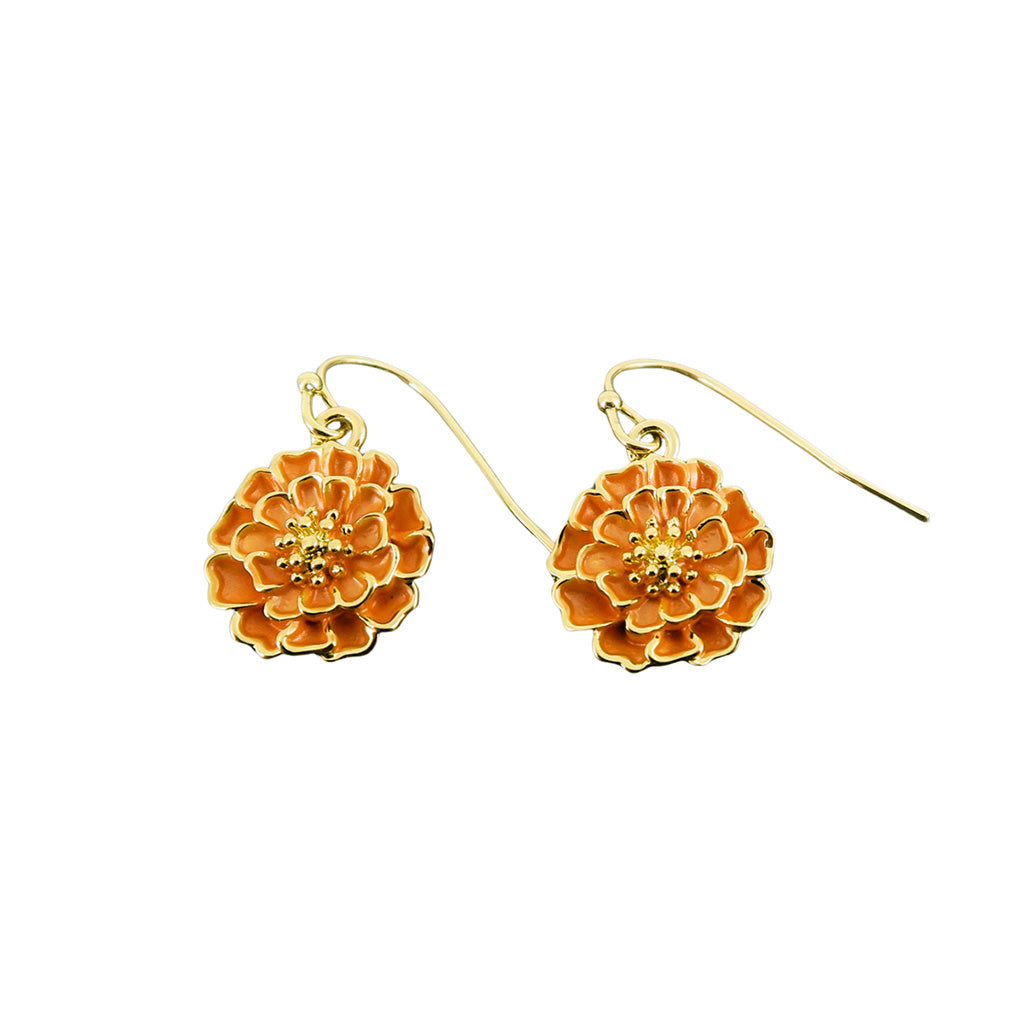 Pair of gold and orange floral earrings on a white background